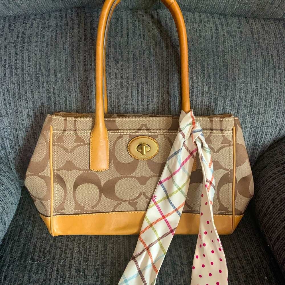 Coach handbag with scarf.